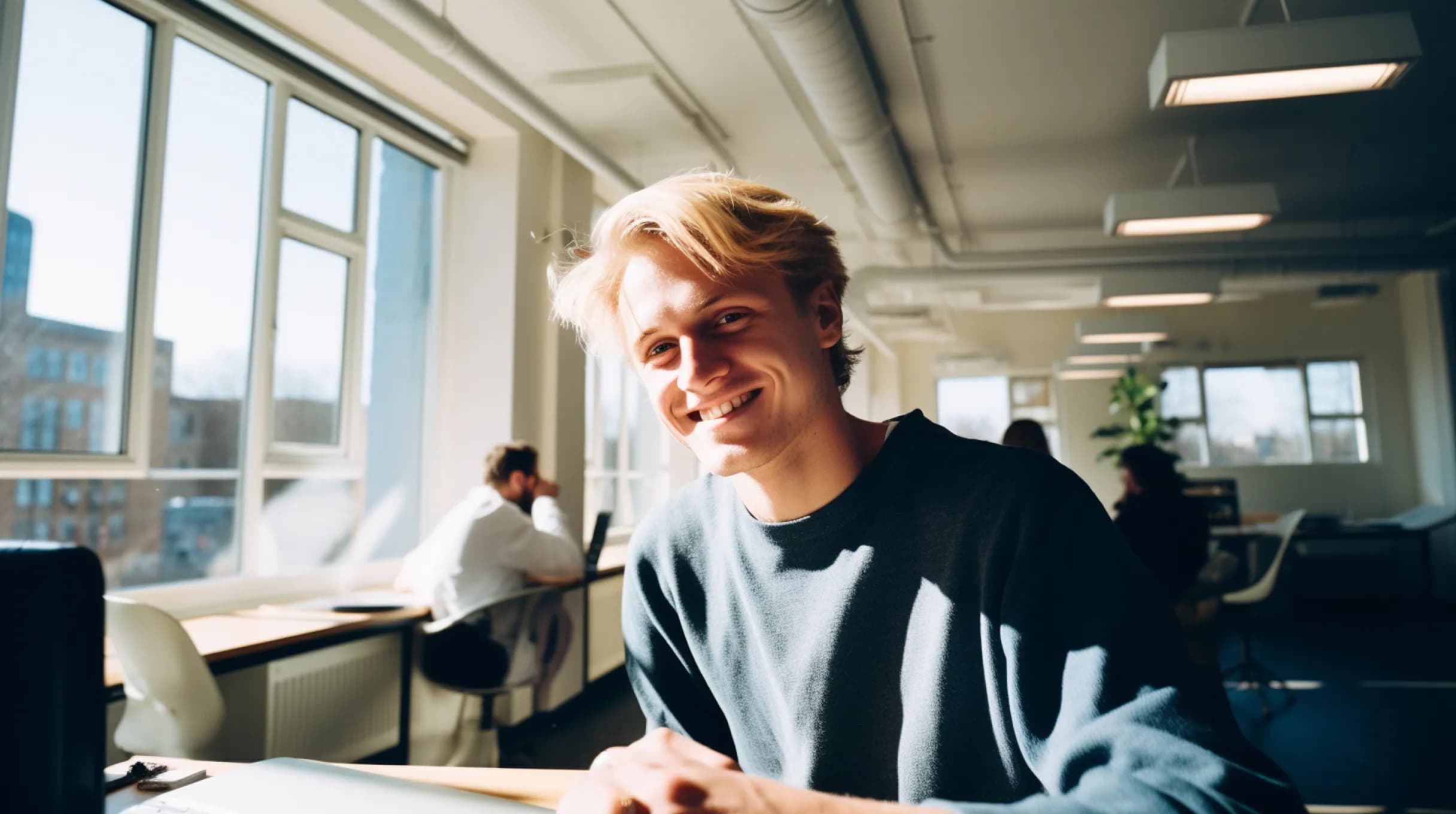 Young man sitting in an office